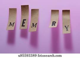 Pieces of paper with the word memory, O is missing, studio shot.