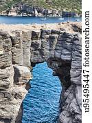 Arched rock formation in sea, Tarrafal, Cape Verde, Africa