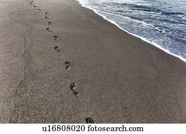 Footprints in sand on coastline, Sao Filipe, Fogo, Cape Verde, Africa