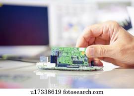 Assembling electronics device.