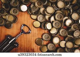 Beer bottle tops and opener.