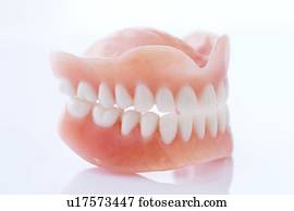 Dentures against a white background.