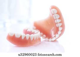Dentures against a white background.