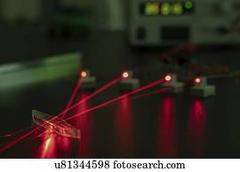 Laser experiment in photonics laboratory.