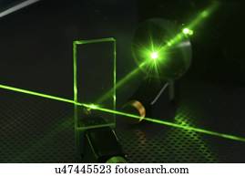 Laser experiment in photonics laboratory.