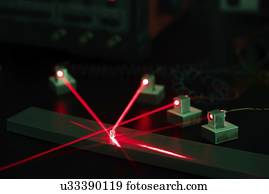 Laser experiment in photonics laboratory.