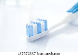 Toothbrush against a white background.