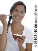 Woman with coconut mask