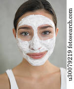 Woman with curd mask