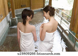 Two naked young women in hot spring talking Picture 