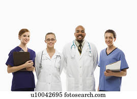 Portrait of African-American man and Caucasian women medical healthcare workers smiling in uniforms standing against white background.