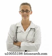 Portrait of smiling Caucasian woman doctor standing against white background.