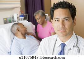 Doctor Standing In Hospital Room