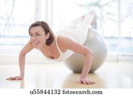 Woman on exercise ball