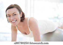 Woman on exercise ball