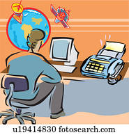 Rear view of a man working on computer in office