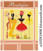 Saleswoman arranging the boutique store window display Saleswoman arranging the boutique store window display