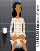 Young woman sitting on toilet