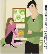 Couple in a living room with the fireplace on