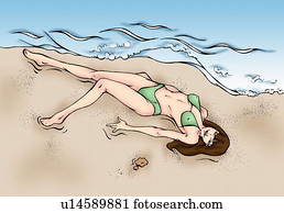 Woman lying by the water on the beach Woman lying by the water on the beach