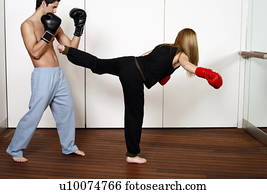 stock photograph of straight right hand punch of active tae bo and