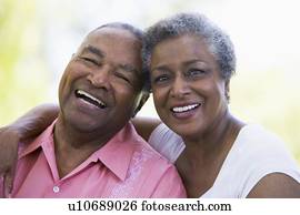 Senior couple sitting outdoors Senior couple sitting outdoors
