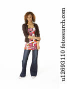 Full Length Studio Portrait Of Teenage Girl