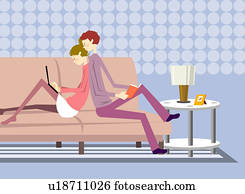 Young couple relaxing on sofa in the living room, side view