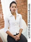 Businesswoman sitting in office space
