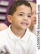 Student in class paying attention (selective focus)