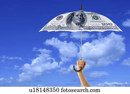 A hand holding an umbrella with paper money design