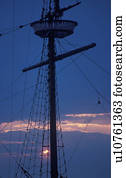 Mast of a schooner at dusk