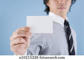 Businessman holding memo Businessman holding memo