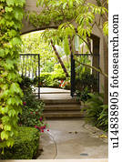 Open-gated archway with foliage