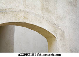 Arched exterior stucco doorway