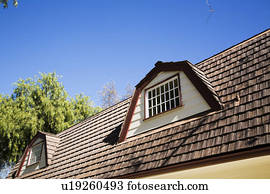Exterior Shot of Traditional Home with Red Trim