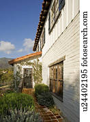 Exterior of Spanish Style Home and Landscape