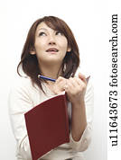 Woman taking the memo Woman taking the memo