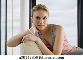 Woman on a sofa. Woman on a sofa.