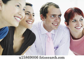 Four happy people looking off camera Four happy people looking off camera