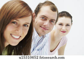 Three happy people, looking at camera Three happy people, looking at camera