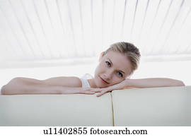 Woman on a sofa. Woman on a sofa.