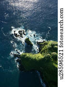 Aerial of rocky coast on Pacific ocean in Maui, Hawaii