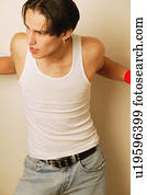 Teenager in white vest