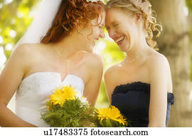 Bride and bridesmaid share memories