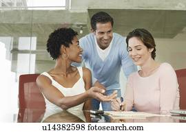 Business colleagues in office meeting