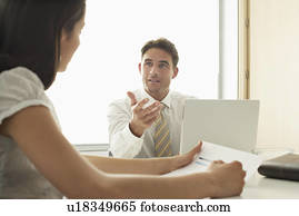 Business man and woman in meeting