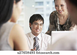 Business people at meeting in office