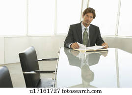 Businessman in Conference Room