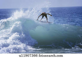 Man surfing on ocean wave